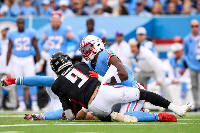 Oct 29, 2023; Nashville, Tennessee, USA; Tennessee Titans linebacker Azeez Al-Shaair (2) sacks Atlanta Falcons quarterback Desmond Ridder (9) during the first half at Nissan Stadium. Mandatory Credit: Steve Roberts-USA TODAY Sports